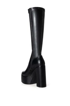 AZALEA WANG SUTTON PU CHUNKY BOOT WITH 4 WAY STRETCH IN BLACK -AKIRA salestore azalea wang sutton pu chunky boot in black black 4 4