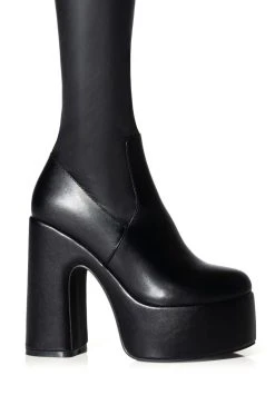 AZALEA WANG SUTTON PU CHUNKY BOOT WITH 4 WAY STRETCH IN BLACK -AKIRA salestore azalea wang sutton pu chunky boot in black black 5 5